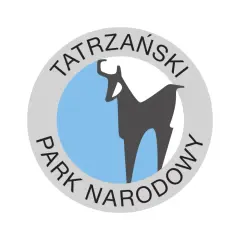 Symbol Tatrzańskiego Parku Narodowego: kozica na tle błękitnego kręgu, otoczona napisem.