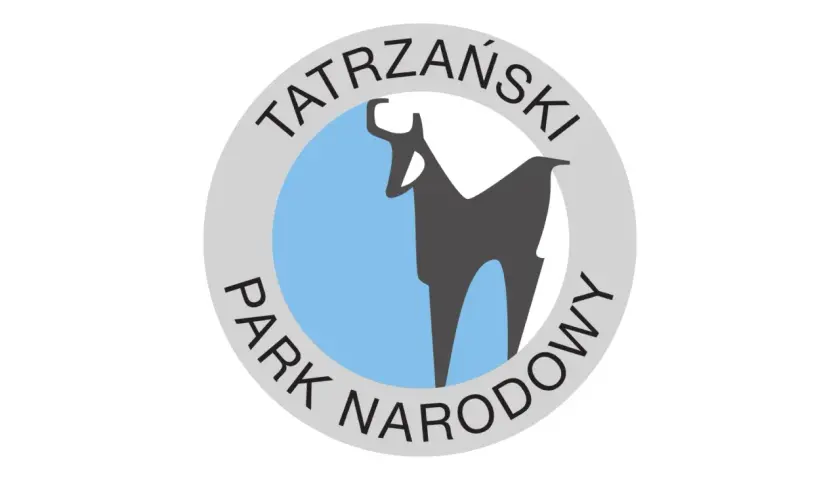 Symbol Tatrzańskiego Parku Narodowego: kozica na tle błękitnego kręgu, otoczona napisem.
